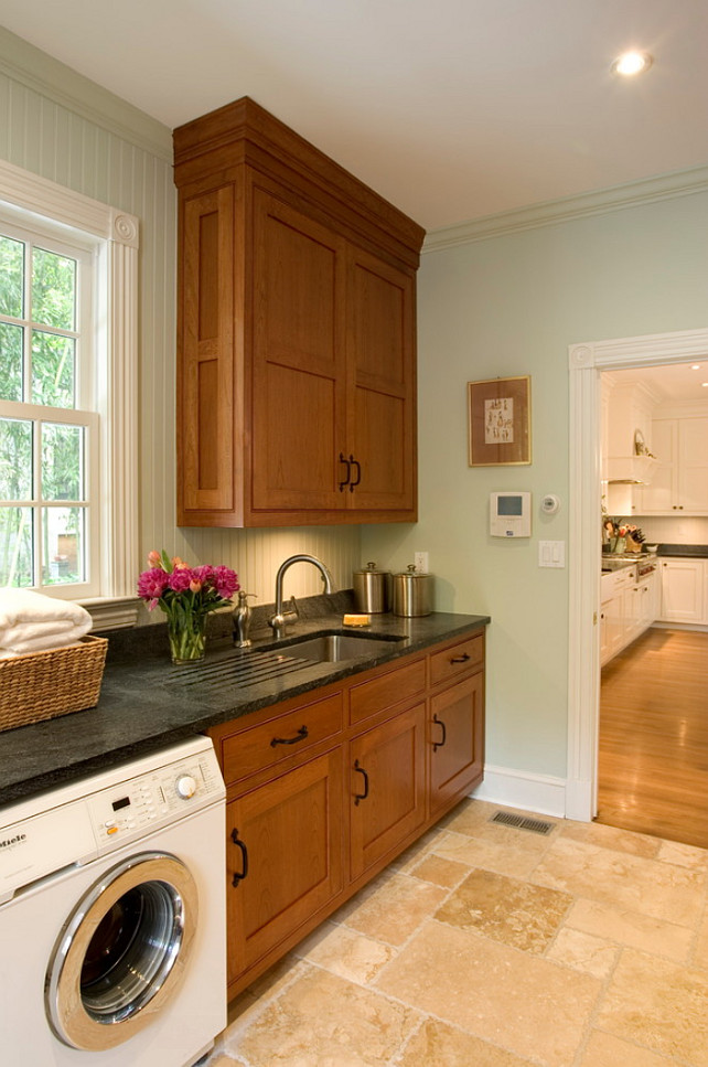 Landry Room Design Ideas. The paint color in this laundry room is Theresa's Green by Farrow and Ball.The counters are black soapstone. #LaundryRoom #FarrowBall #TheresasGreen #PaintColor #LaundryRoomDesign