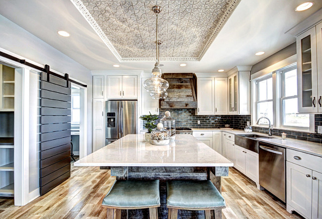 Transitional Kitchen. Transitional Kitchen with Reclaimed Wood Island. #ReclaimedWoodKitchen #Kitchen #TransitionalKitchen Dwellings Inc.