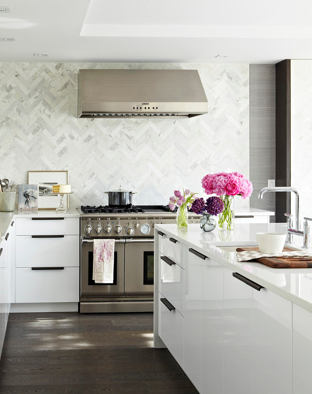 White Kitchen Backsplash. White Kitchen Backsplash Ideas. Herringbone Marble Backsplash on white kitchen. #WhiteKitchen #Backsplash #WhiteKitchenBacksplash #HerringboneBacksplash #HerringboneMarbleBacksplash Croma Design Inc.