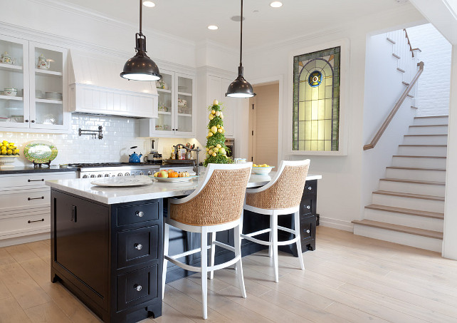 Benjamin Moore Simply White OC-117. White Kitchen Ebody Island. White Kitchen Cabinet with Ebony Stained Kitchen Island. #WhiteKitchen #EbonyIsland Graystone Custom Builders.