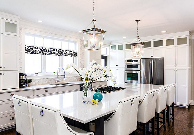 White Kitchen. Transitional kitchen with crisp white cabinets and modern design. #Kitchen #WhiteKitchen #CrispwhiteKitchenCabinet