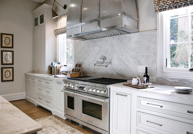 White Kitchen. White Kitchen with quartzite countertop. White Kitchen cabinet and quartzite countertop. #WhiteKitchen #quartziteCountertop Barbara Brown Photography. Bell Kitchen and Bath Studios.