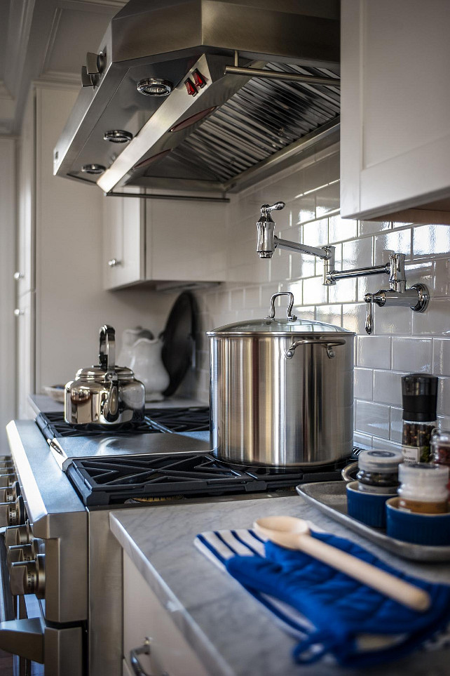 White Subway Tiles Backsplash with a handy wall-mounted pot filler. #KitchenBacksplah #SubwayTiles #Potfiller