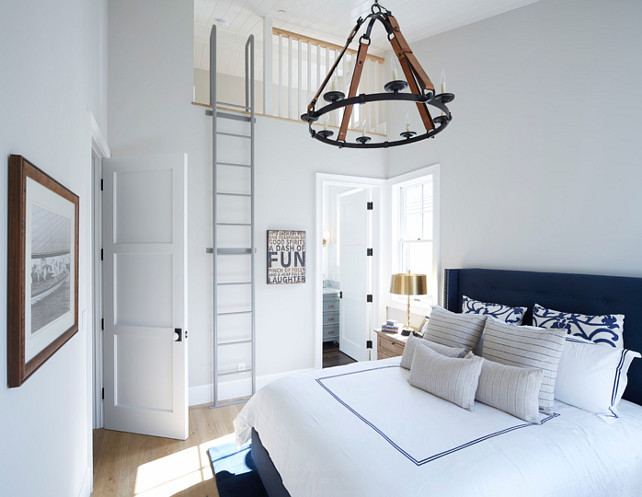 White and navy coastal bedroom. Chandelier is the Suzanne Kasler Dressage Round Ceiling Light. #WhiteandNavy #Bedroom #Coastal DTM INTERIORS