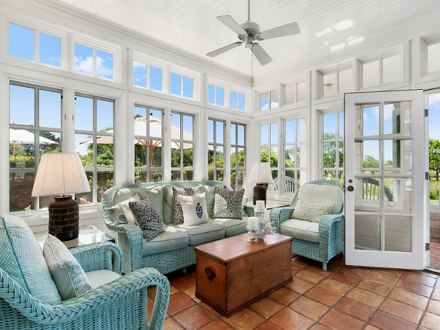 Wicker Furniture. Cottage sunroom with painted antique wicker furniture. The antique wicker furniture is painted in a turquoise paint color and the cushions were done using outdoor fabric. #WickerFurniture #AntiqueWickerFurniture #PaintedWickerFurniture