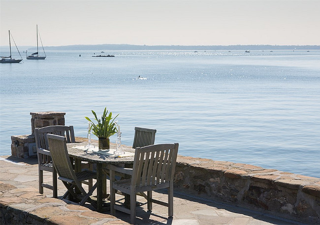 Dining by the waves. Christie's Real Estate.