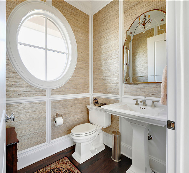 Powder Room. This powder room has grasscloth wallpaper on walls. The mirror is from Uttermost, Gella #12595 #Wallpaper #Grasscloth