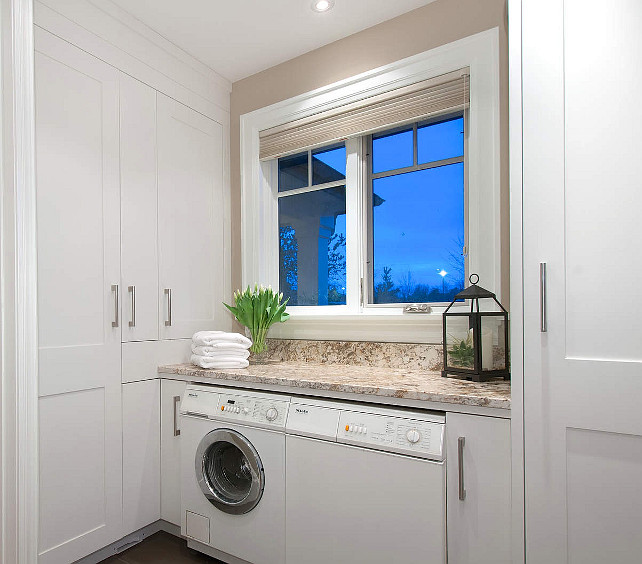 Laundry Room. This is a very modern, clean-lined laundry room. I am loving the miele machines. #LaundryRoom #Miele